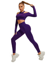 Person wearing a purple athletic outfit on a plain background