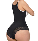 Black bodysuit with lace details on a white background
