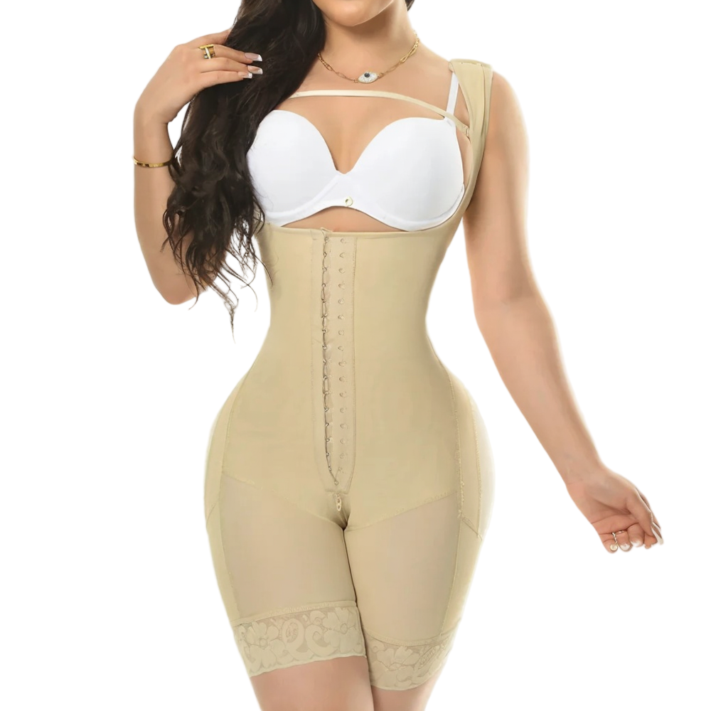 Woman wearing a beige body shaper and white bra on a white background