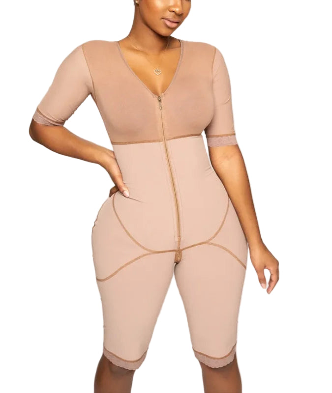 Woman wearing a beige shapewear jumpsuit on a white background