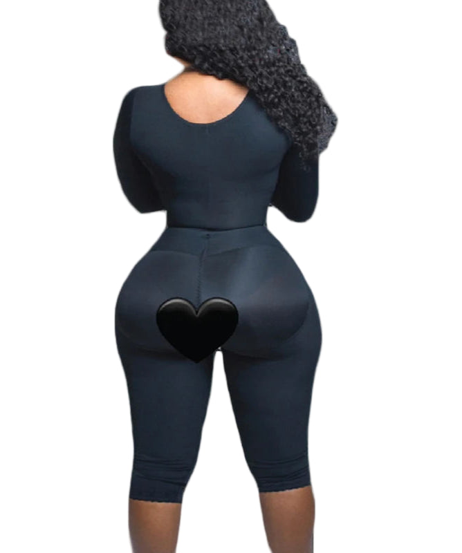 Person wearing a dark blue bodysuit on a white background