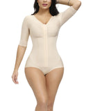 Woman wearing a beige shapewear bodysuit on a white background