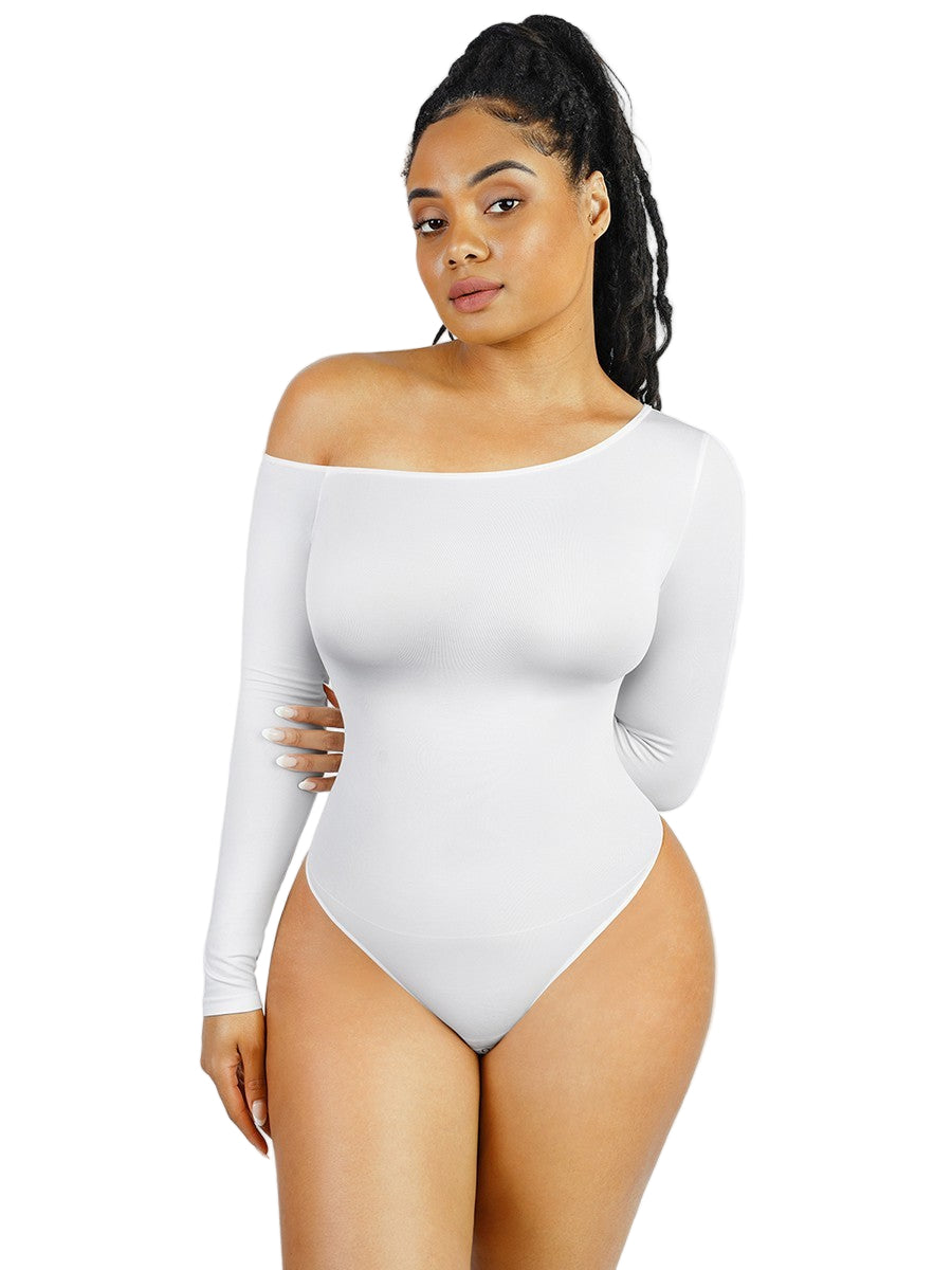 Woman wearing a white off-shoulder bodysuit against a light gray background