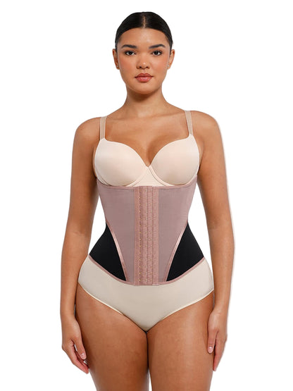 Woman wearing a beige and black shapewear bodysuit on a white background