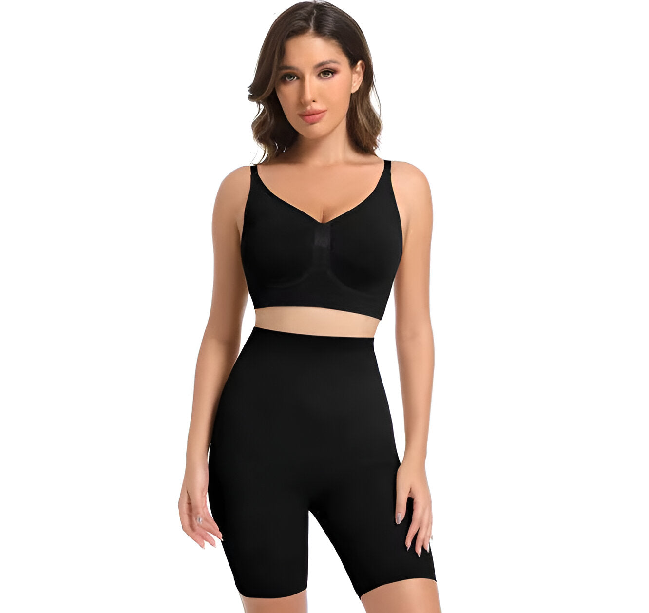 Woman wearing a black shapewear outfit on a white background