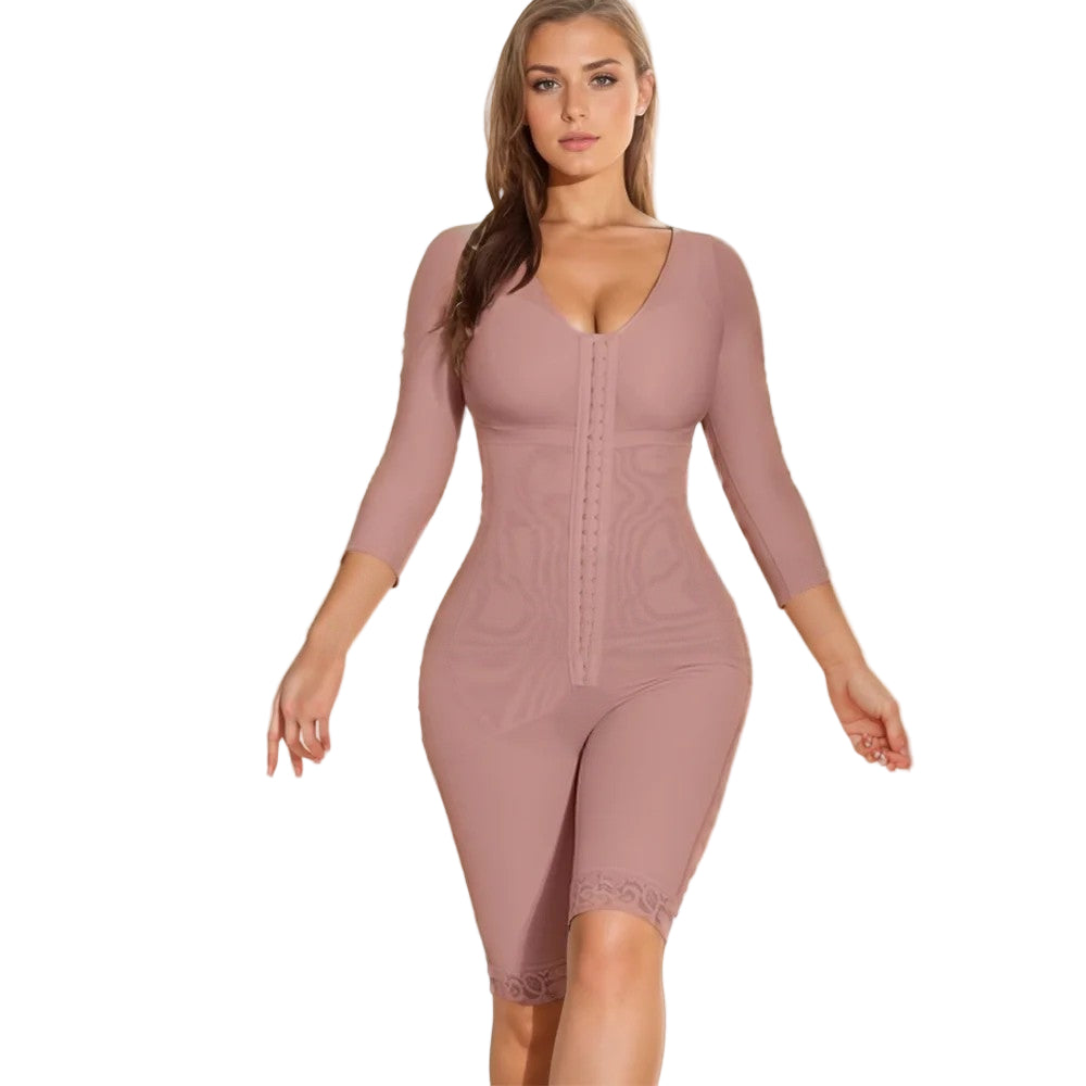 Woman wearing a mauve bodycon dress against a neutral background