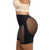 Black sheer shorts with beige top on a white background