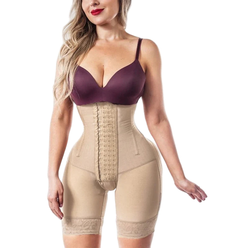 Woman wearing a beige shapewear garment on a white background