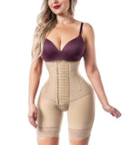 Woman wearing a beige shapewear garment on a white background