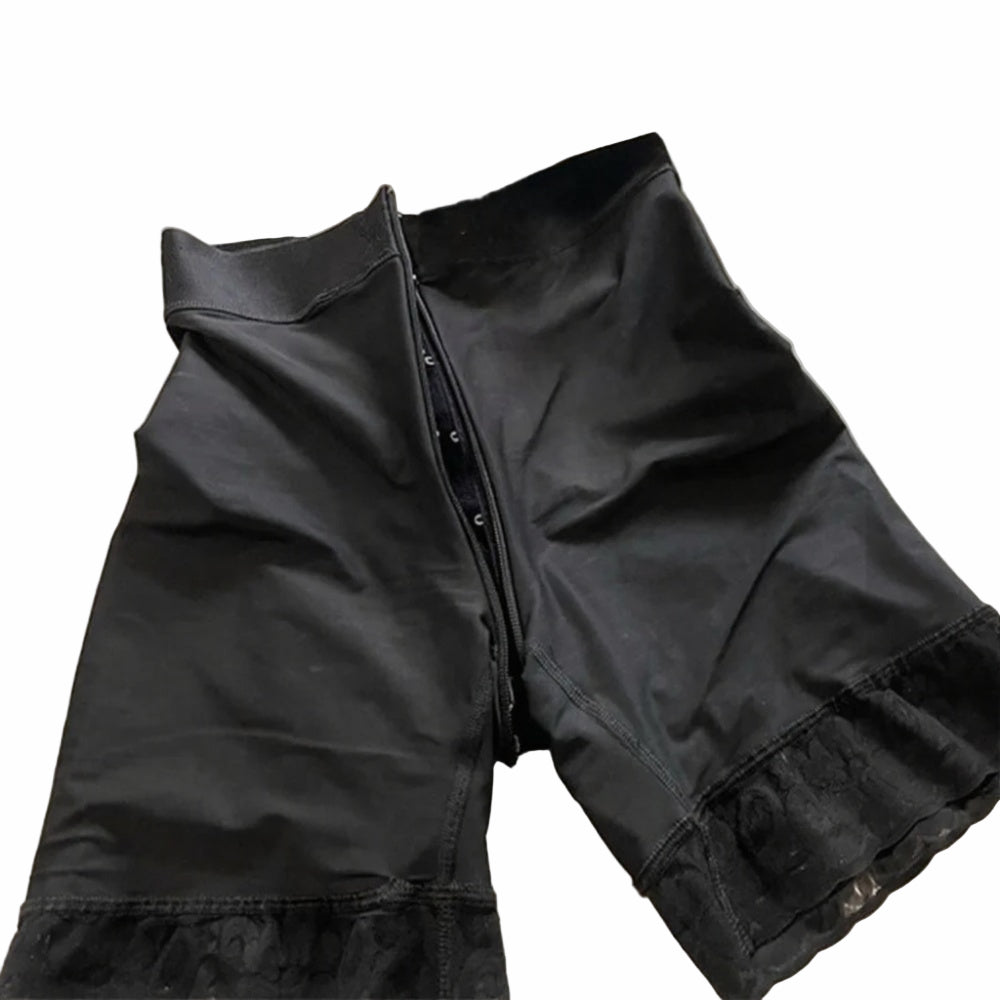 Black pants with a zipper on a light background
