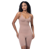 Woman wearing a beige bodysuit against a light purple background