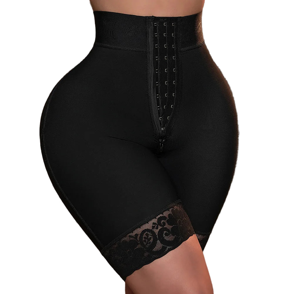 Black shapewear with lace details on a brown background
