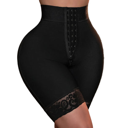 Black shapewear with lace details on a brown background