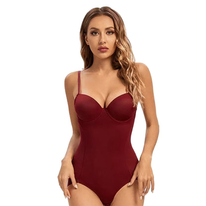 Woman wearing a burgundy bodysuit on a white background