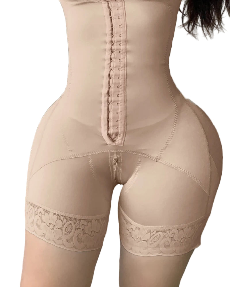 A pair of high-waisted white butt lifter shaping shorts with a decorative lace trim and front zipper closure, designed for tummy control and waistline enhancement.