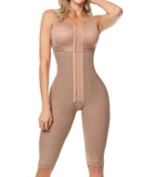Beige shapewear jumpsuit worn by a model on a white background