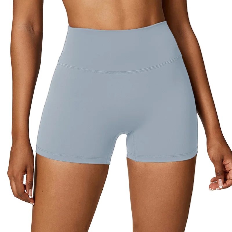 Light blue athletic shorts worn by a person on a white background