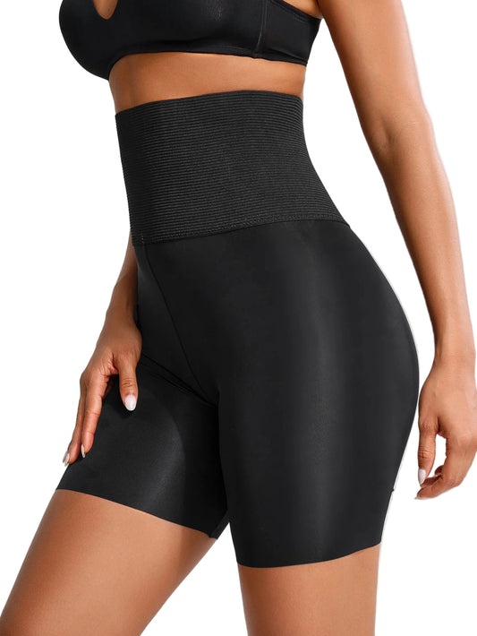 Black athletic shorts worn by a person on a light gray background