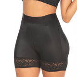 Black shapewear shorts with lace detailing on the hem, designed for tummy control and hip enhancement.