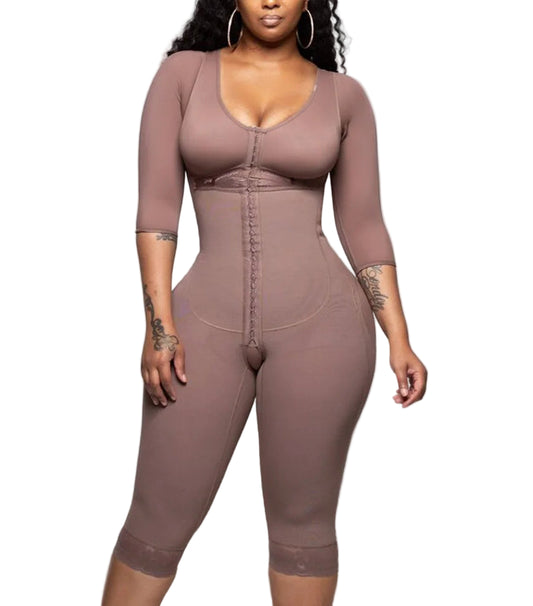 Person wearing a brown bodysuit against a plain background