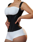 Person wearing a black waist trainer over white underwear on a gray background