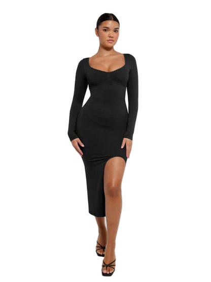 Black long-sleeve dress with a slit on a white background