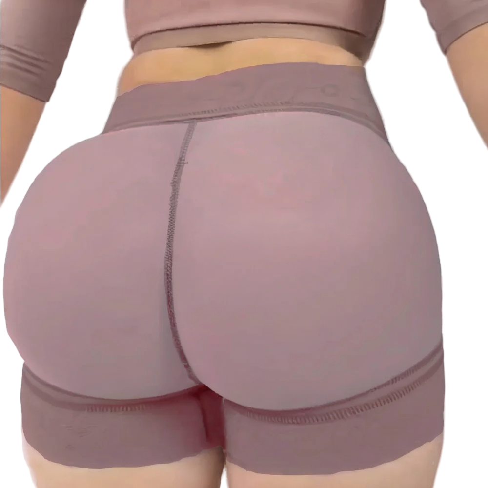 Person wearing a pair of mauve shorts on a white background