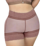 Mauve high-waisted shorts with lace trim on a plain background